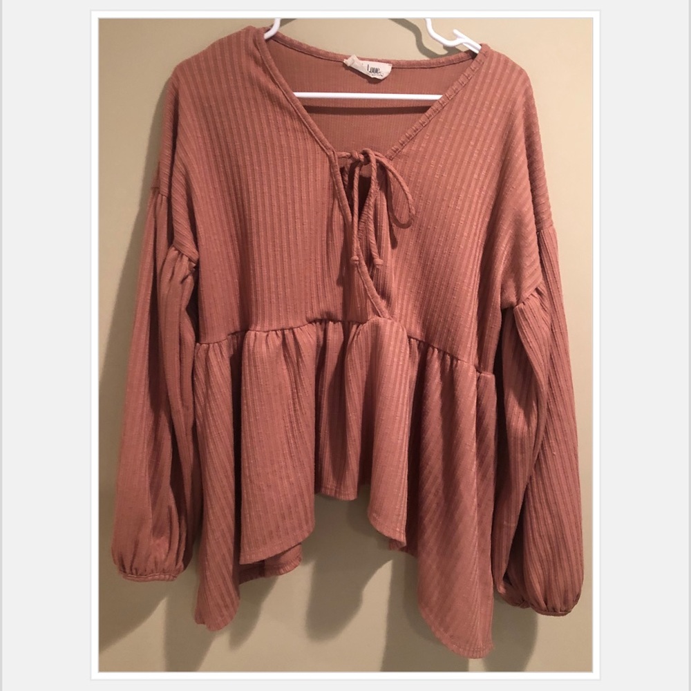 Peach love oversized baby doll shirt in a peachy blush color. Size Medium.